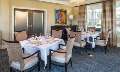 Elegant dining room setup with multiple tables
