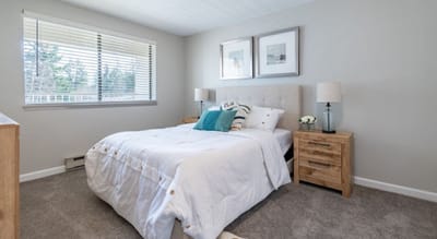 Cozy bedroom with a bed and nightstands