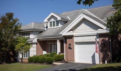 Exterior view of a brick building with landscaping