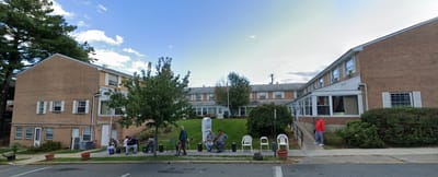 Residents relaxing outside the facility