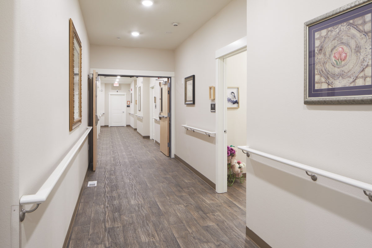 Bright hallway of a memory care facility