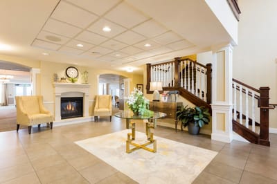 Welcoming lobby area with seating and fireplace