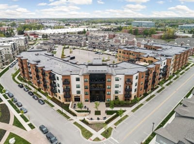 Aerial view of a senior living facility with outdoor spaces