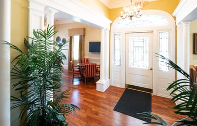 Interior entrance of a retirement community with plants