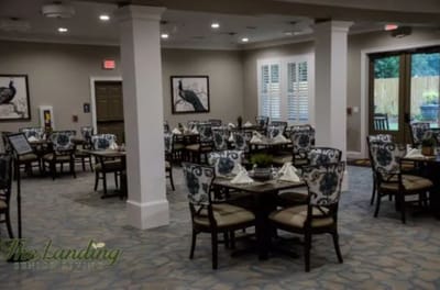 Elegant dining area with decorated tables and chairs
