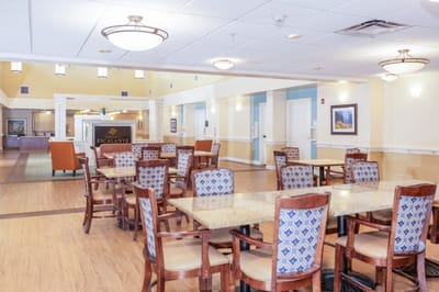 Bright dining area with tables and chairs