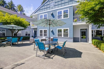 Outdoor patio with seating and umbrellas