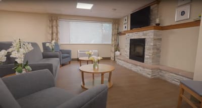 Cozy common area with seating and fireplace