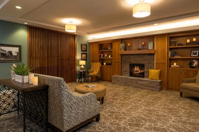 Cozy common area with a fireplace and seating