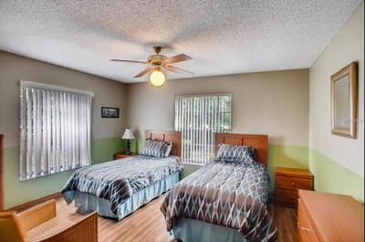 Cozy resident room with two beds and window