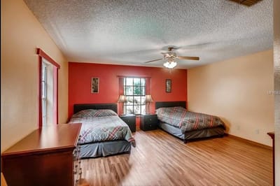 Private resident room with two beds and natural light