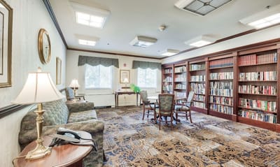 Common area with bookshelves and seating