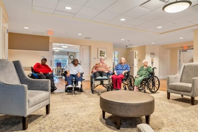 Residents engaging in social time in a common area.