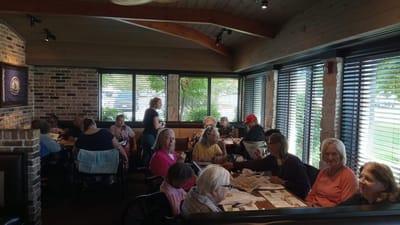 Residents enjoying a meal in the dining area