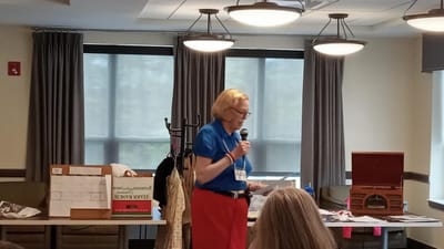 Resident presenting at an activity event.