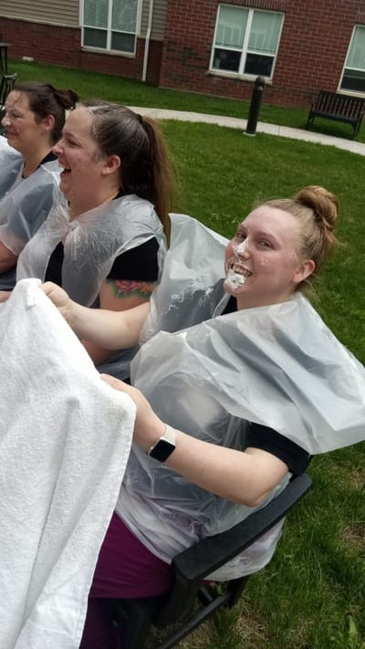 Residents enjoying a playful outdoor activity.