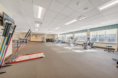 Interior view of a fitness area with equipment.
