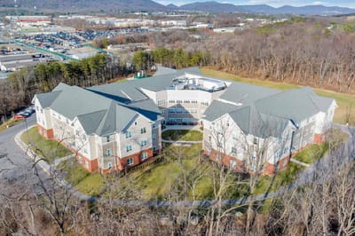 Aerial view of the facility buildings and outdoor space.