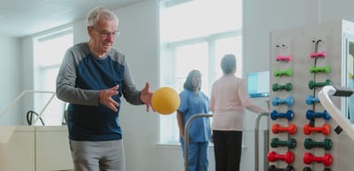 Senior engaging in recreational activity with a ball.