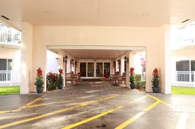 Entrance area decorated for the holidays with benches