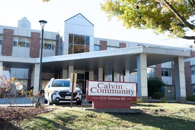 Exterior view of Calvin Community facility with sign