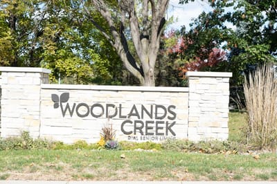 Signage for Woodlands Creek Senior Living facility
