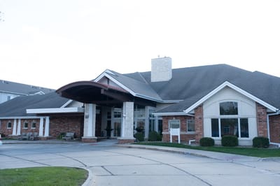 Exterior view of Woodlands Creek Senior Living facility