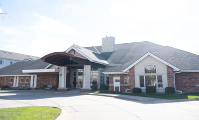 Exterior view of Woodlands Creek Senior Living facility