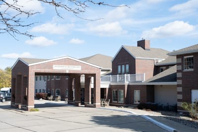 Exterior view of Woodlands Creek Senior Living facility