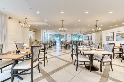 Bright dining room with elegant table settings