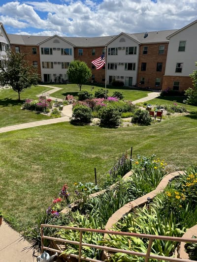 Beautiful garden area with walking paths and flowers