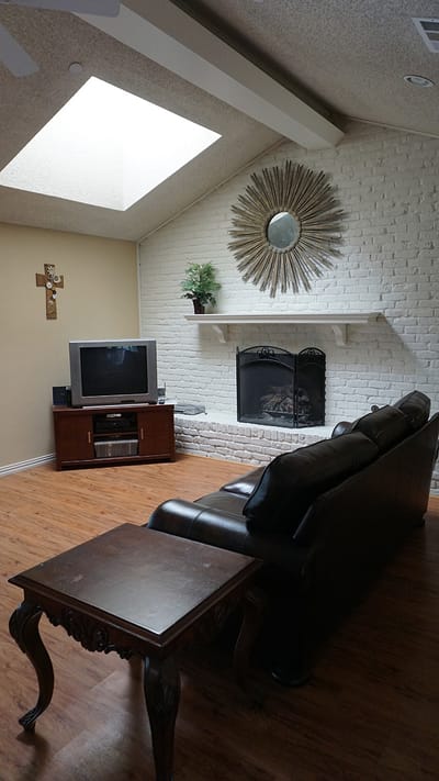 Cozy common area with a fireplace and seating