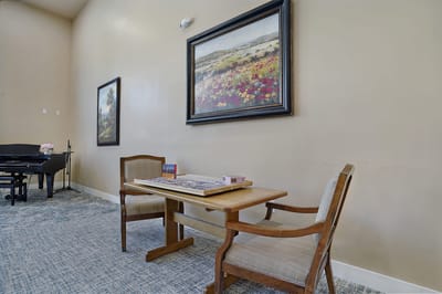Interior view of a common area with a table and chairs