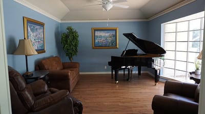 Cozy interior lounge area with a grand piano