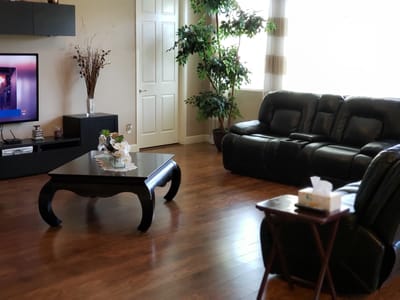 Interior view of a cozy common area with seating