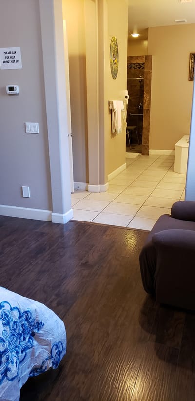 Interior view of a private resident room and bathroom