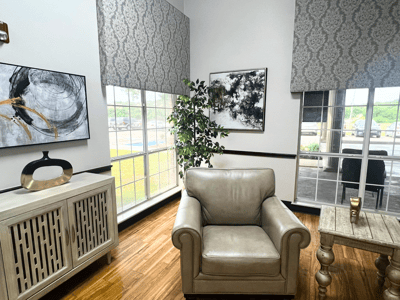Cozy common area with seating and artwork