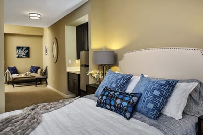 Cozy resident room with modern decor and furnishings