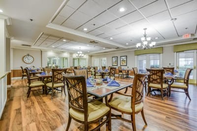 Dining area with tables set for meal service