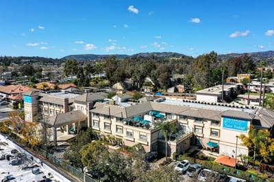 Aerial view of Gardens at Escondido with surrounding landscape