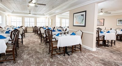 Dining area with tables set for meals