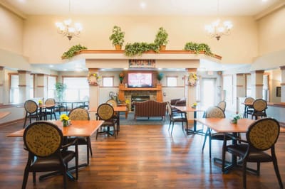 Bright common area with tables and chairs