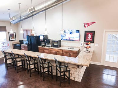 Interior view of a cafe area with a counter and seating