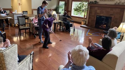 Residents participating in an activity in the common area