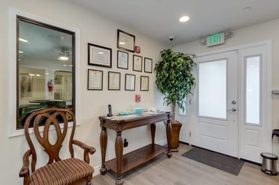 Interior lobby with certificates and a welcoming entrance