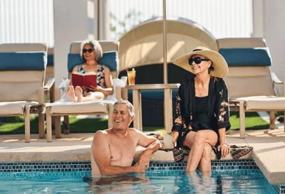 Residents enjoying time by the pool