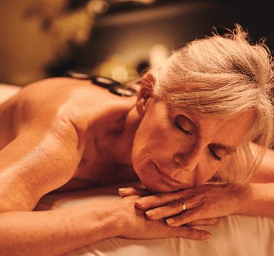 Woman receiving a massage in a spa setting