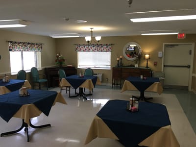 Dining area with tables set for a meal