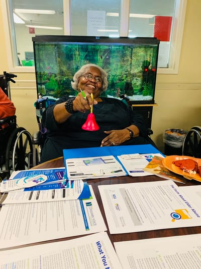 Resident engaging in an activity with materials