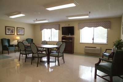 Bright common area with tables and chairs